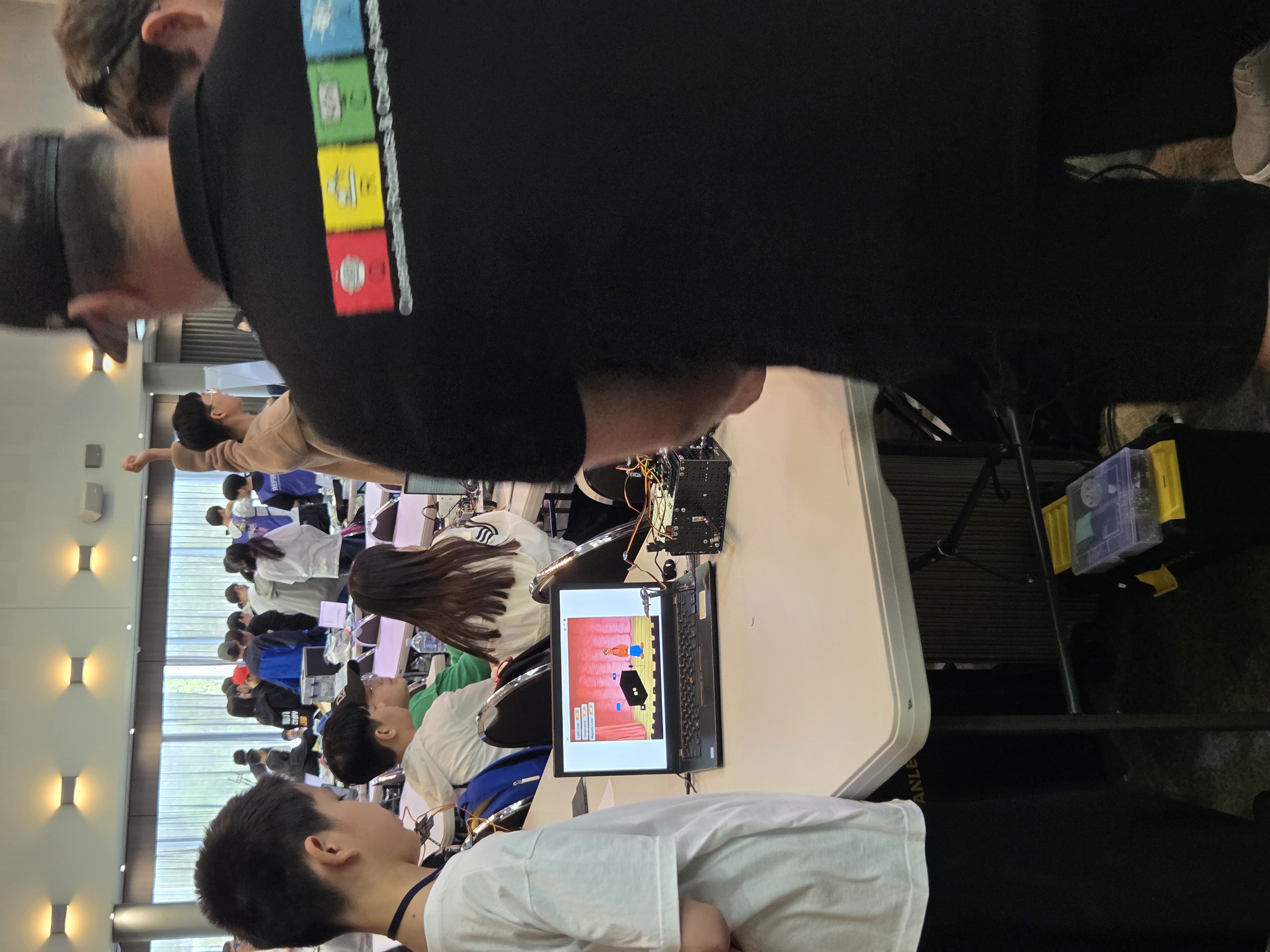 Student-built emotional systems project display on a table.